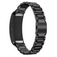 Black metal watch strap with three-pearl link design, side view