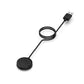 Black USB-A charging cable with coiled wire and round charging dock.