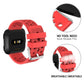 Breathable perforated TPU watch strap with quick-release for Fitbit Versa, red-orange.