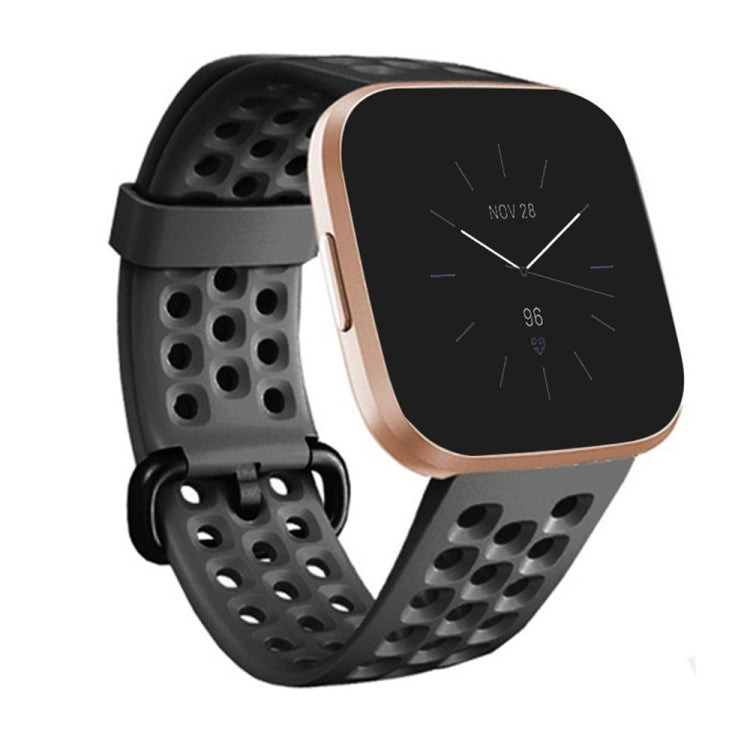 Large breathable silicone watch band with perforated strap and adjustable buckle, black.
