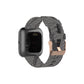 Canvas watch strap in black with white stripe pattern and metal clasp