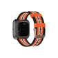 Canvas watch strap in black with orange and white stripe pattern and metal clasp