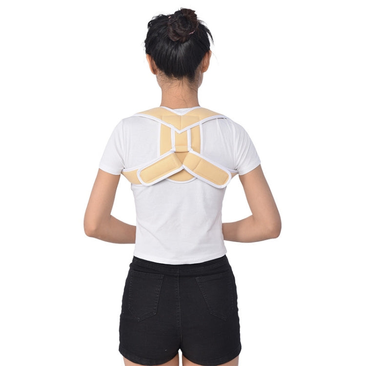 Children’s posture corrector with light beige and white straps, adjustable back brace