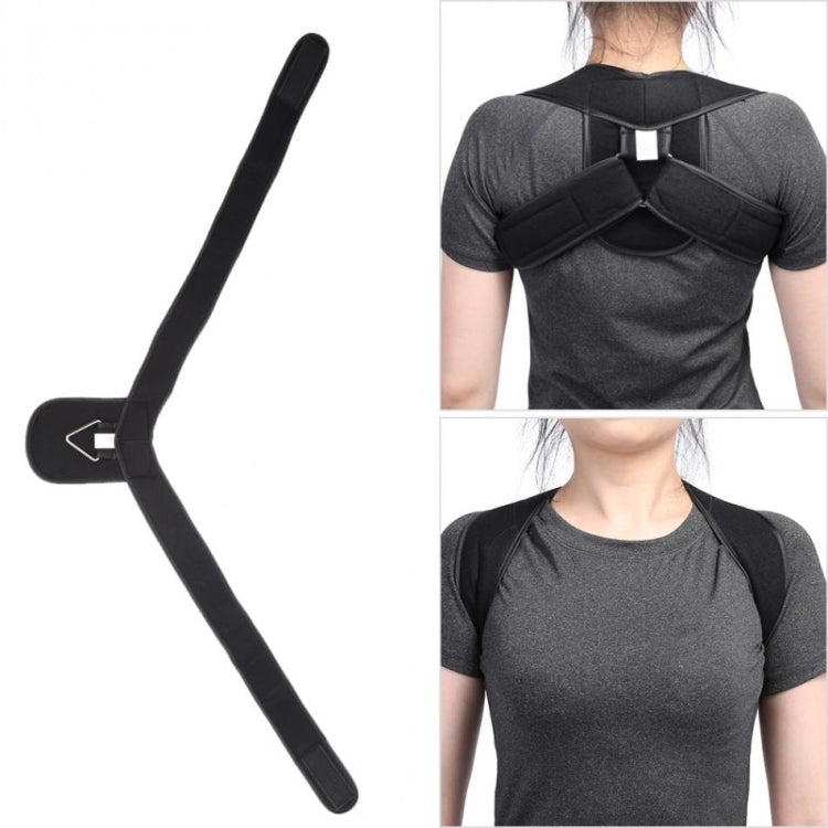 Children’s posture corrector in black with padded cross straps and back support