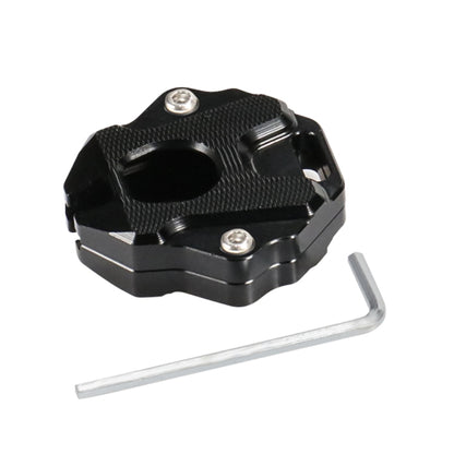 Black motorcycle key shell with textured grip and two metal screws