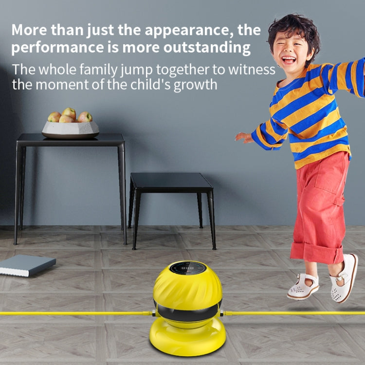Yellow skipping rope machine on the floor with top digital display