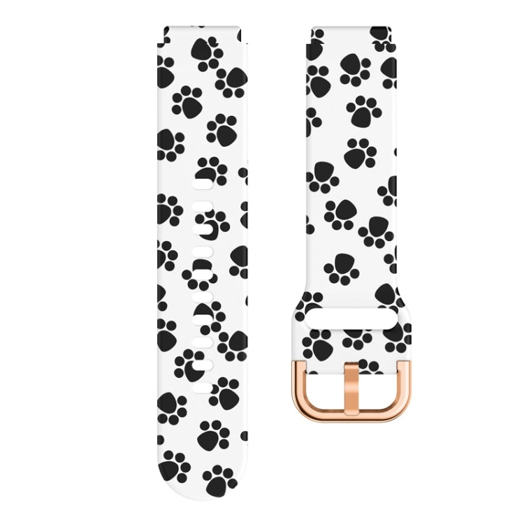 Silicone watch band with white base and black paw print, rose-gold buckle
