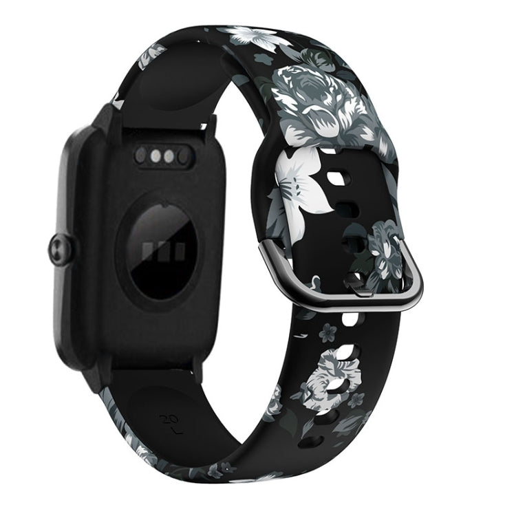 Black floral silicone watch band with rose-gold buckle and clasp, black watch module.