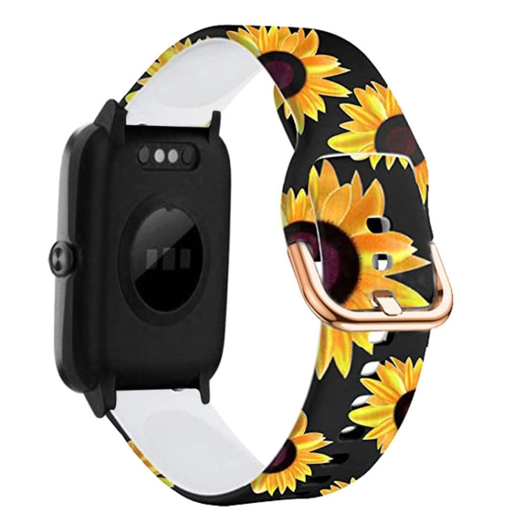 Silicone watch band with black base and sunflower print, rose-gold clasp