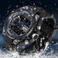Black digital sports watch with round bezel, multi-dial display, shown in water splashes