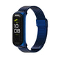 Blue stainless steel mesh watch band with buckle clasp for fitness tracker.