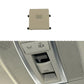 Beige sunroof dome light switch button with vent-style icon and side mounting tabs
