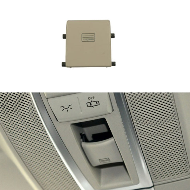 Beige sunroof dome light switch button with vent-style icon and side mounting tabs
