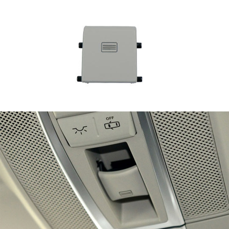 Grey sunroof dome light switch button with vent-style icon and side mounting tabs