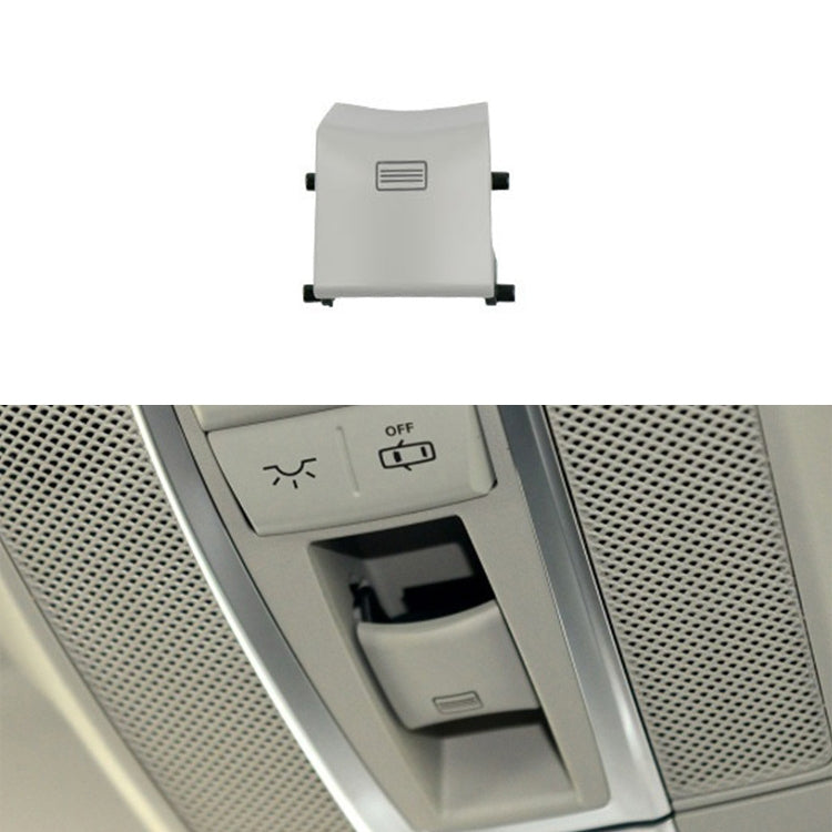 Light grey sunroof dome light switch button with vent-style icon and side mounting tabs