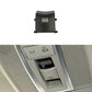 Car dome light switch button, flat black, with small ridged lamp icon