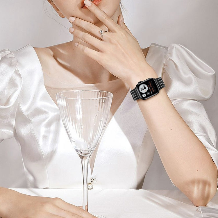 Smartwatch on wrist with rose gold stainless steel mesh band