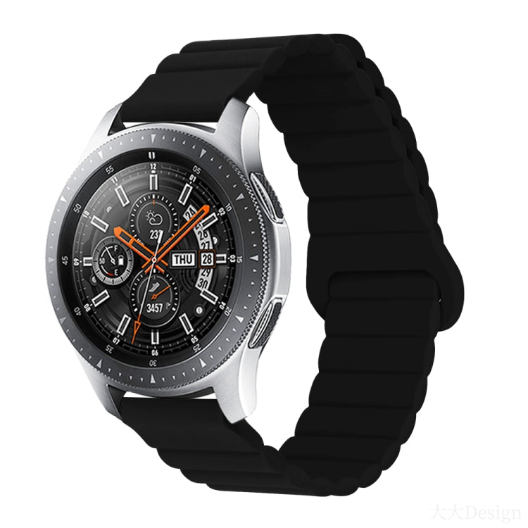Smart watch with black silicone band and metal clasp, round black dial with orange details