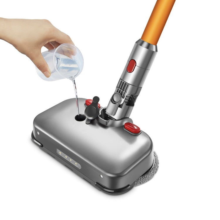 Electric wet and dry mopping head with gray base, red controls, and spinning brush