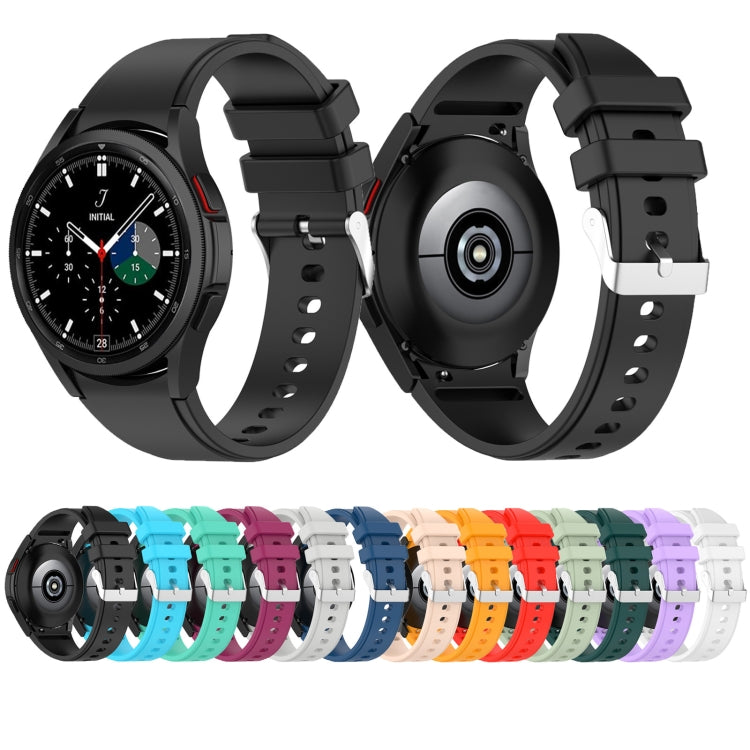 Silicone watch bands in assorted colors, perforated straps, and metal clasp