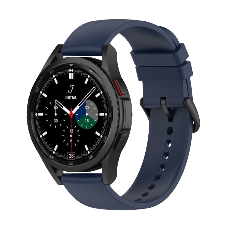 Midnight blue silicone watch band with clasp and perforated strap on watch front