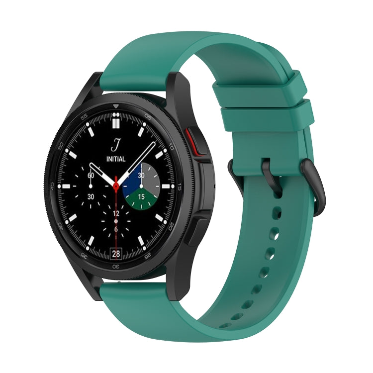 Pine green silicone watch band with clasp and perforated strap on watch front