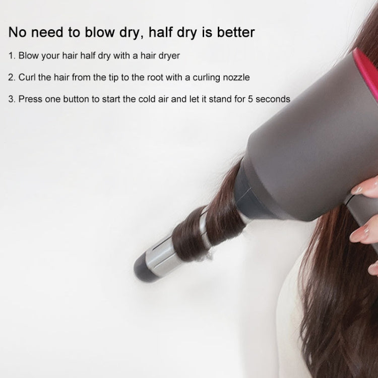 Hair curling roller attachment on a hair dryer over dark hair strands.