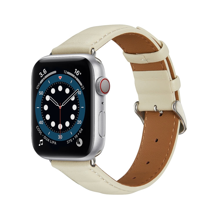 Cream genuine leather watch band with metal buckle and pin-adjusted strap.