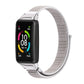 Breathable nylon watch band with silver hardware and light gray woven fabric