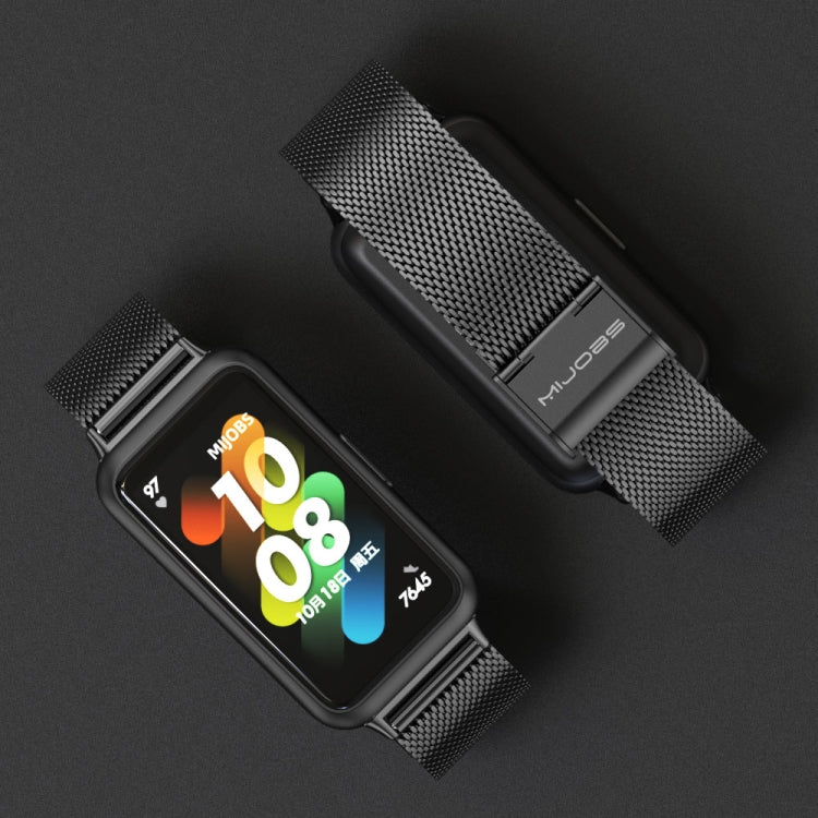 Dark gray stainless steel mesh watch band with metal buckle clasp.