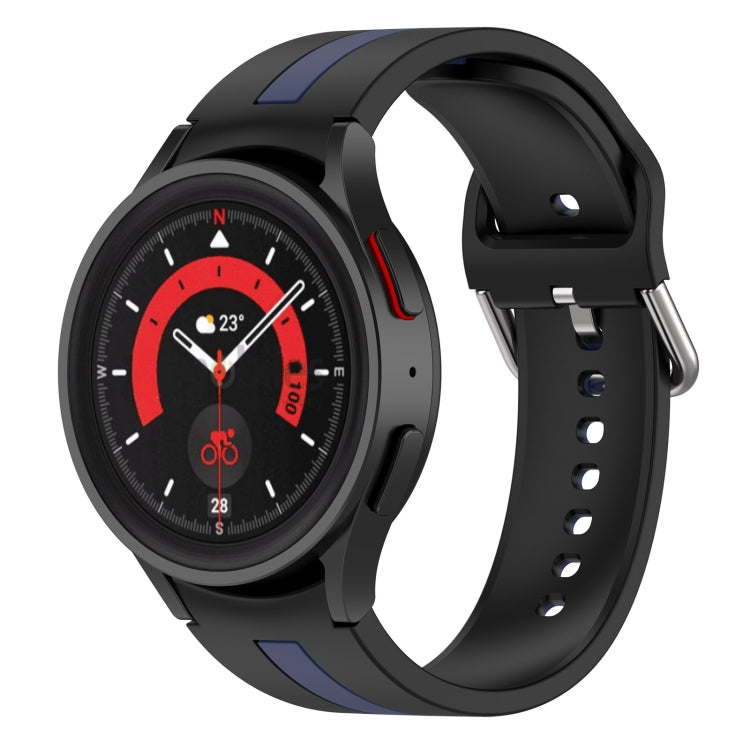 Two-tone striped silicone watch band in black with blue stripe details and vented clasp.