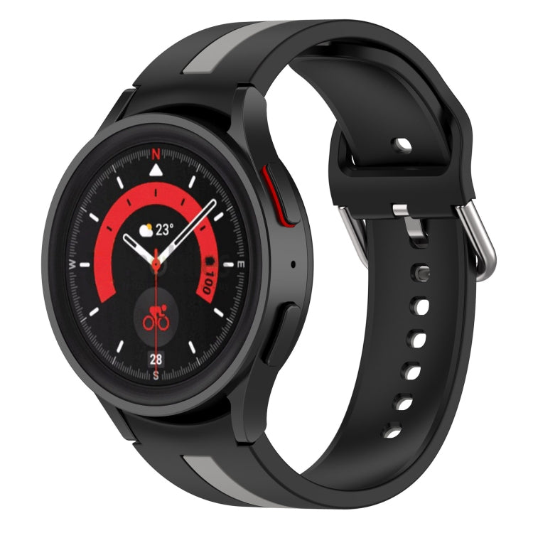 Two-tone striped silicone watch band in black with no visible accent stripe on the bezel.