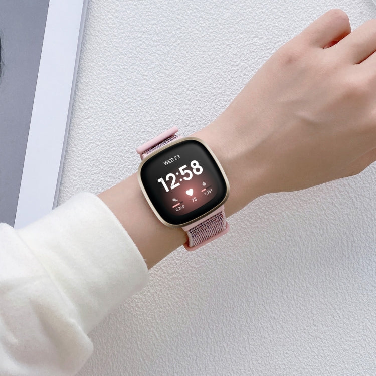 Rose pink nylon rubber watch band with buckle on wrist for Fitbit Versa 3