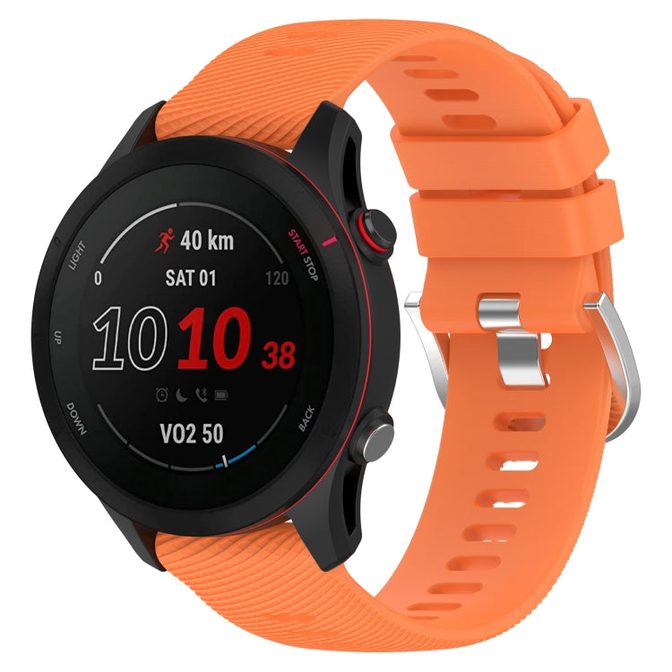 Orange cross-textured silicone watch band with secure clasp, 18mm width.
