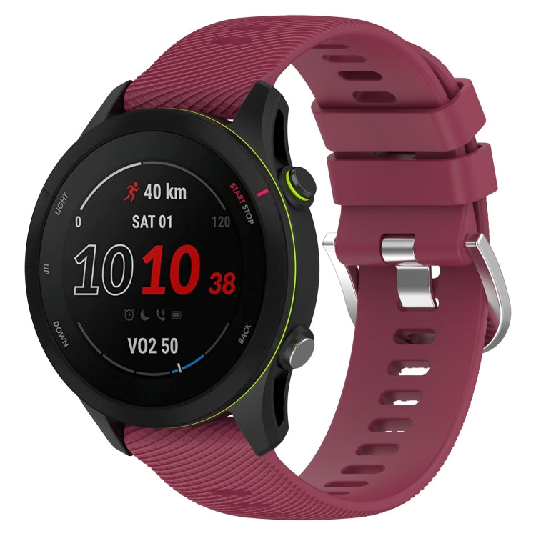 Wine red cross-textured silicone watch band with secure clasp, 18mm width.