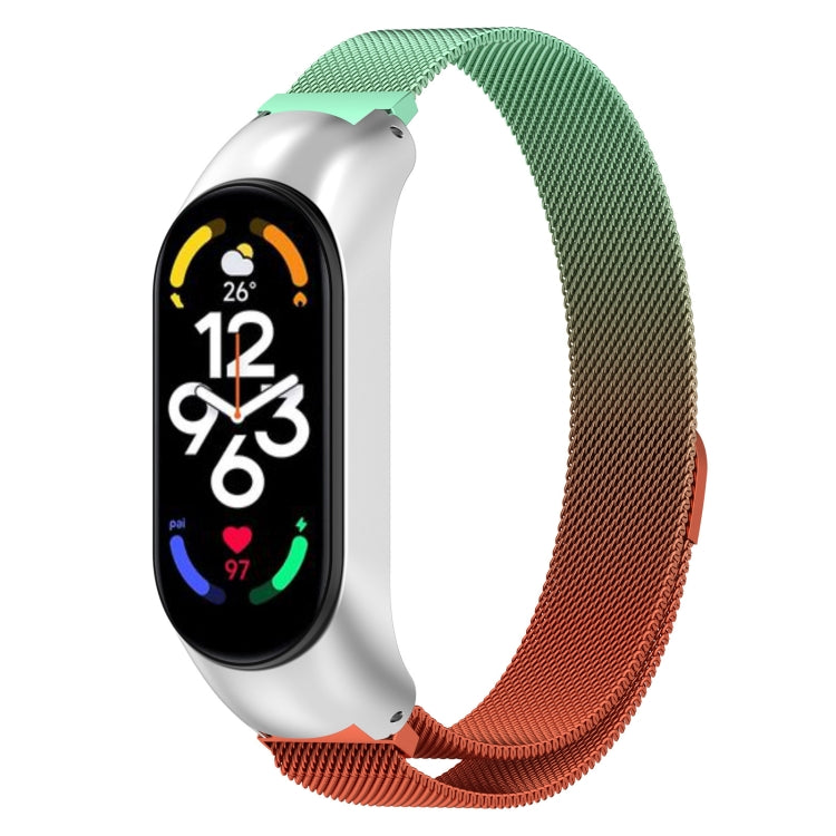 Green metal Milanese watch band with stainless clasp and copper end.