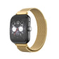 Milanese stainless steel watch band in gold, shown with a smartwatch.