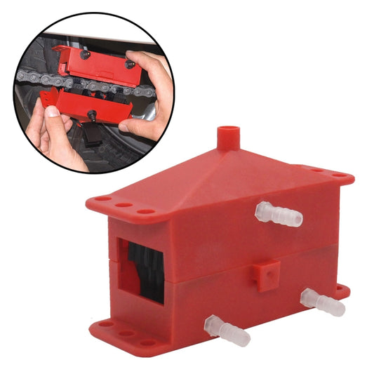 Red motorcycle chain cleaning tool base with three white cleaning nozzles