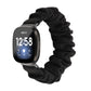 Solid black cloth scrunch watch band for smart watch; smartwatch shown.