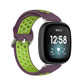Dual-color silicone watch band with purple outer strap and lime green perforated insert