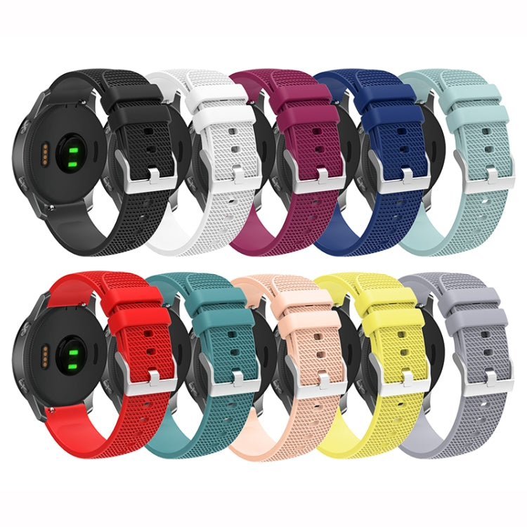 Assorted silicone smartwatch bands with pockmarked silver buckles in multiple colors