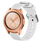 White silicone watch band with vertical grain texture, buckle clasp, and strap holes