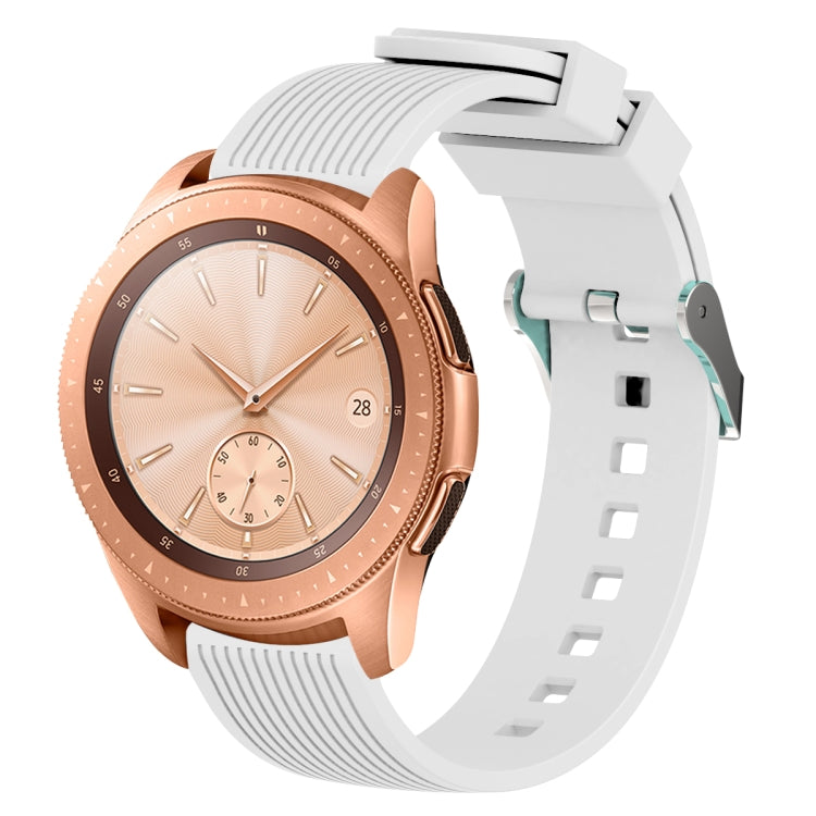 White silicone watch band with vertical grain texture, buckle clasp, and strap holes