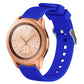 Sapphire blue silicone watch band with vertical grain texture, buckle clasp, and strap holes