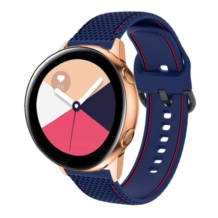 Two-color silicone watch band with navy mesh texture and red contrast stitching