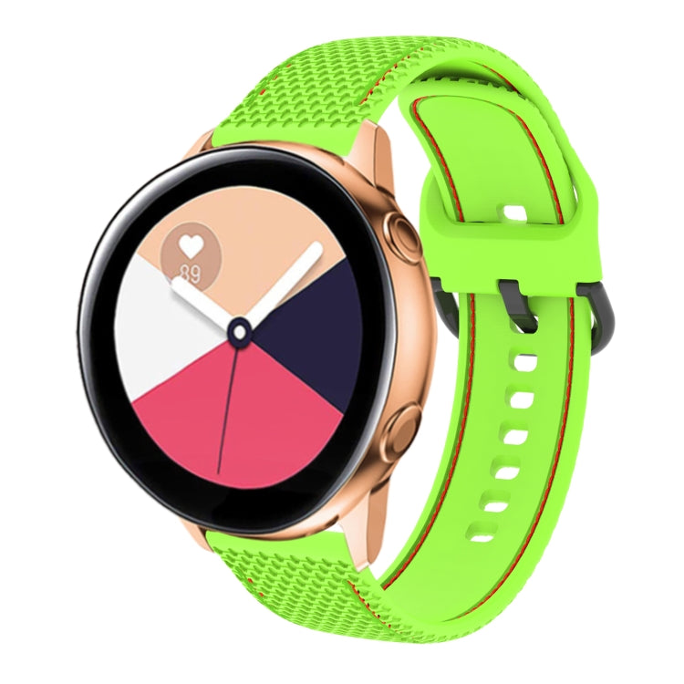 Two-color silicone watch band in lime green with green contrast edge stitching