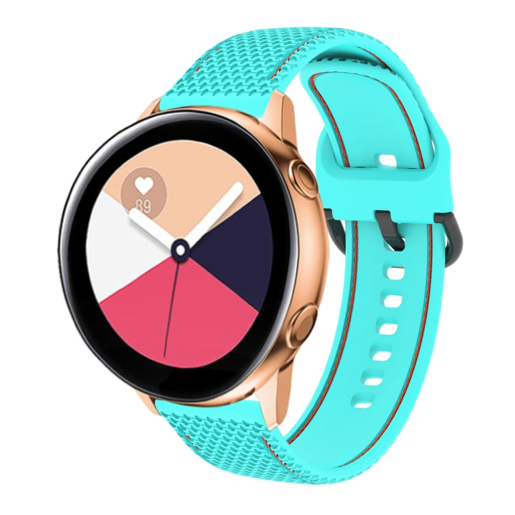 Two-color silicone watch band in teal blue with light blue contrast stitching