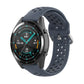 Dark gray silicone sport watch strap with perforated holes and metal clasp for secure fit