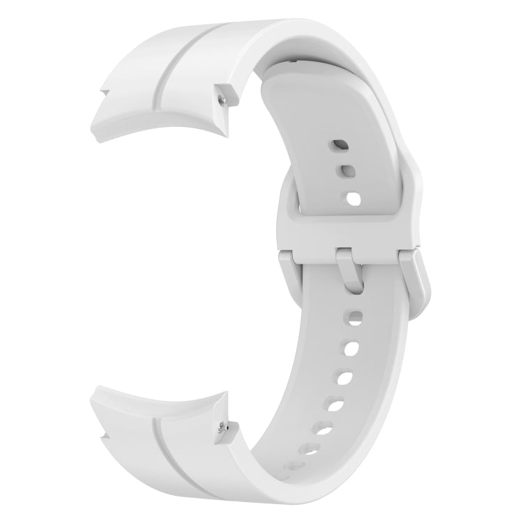White silicone watch band with buckle and perforated strap holes, angled view