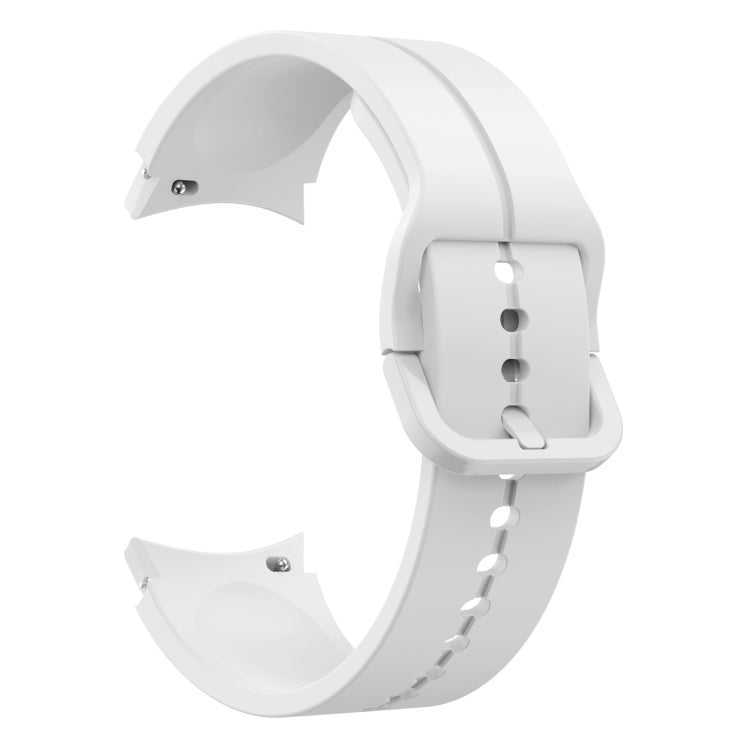 White silicone watch band with buckle and underside view of strap holes